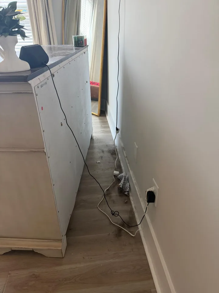 Before — Deep Clean: Behind furniture, Months of dust, Cable tangle.